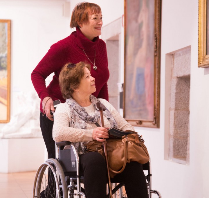 Disabled lady in art gallery