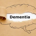Brain graphic representing dementia awareness and specialist support.
